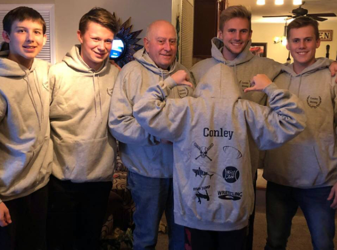Customers wearing TeeTime hoodies